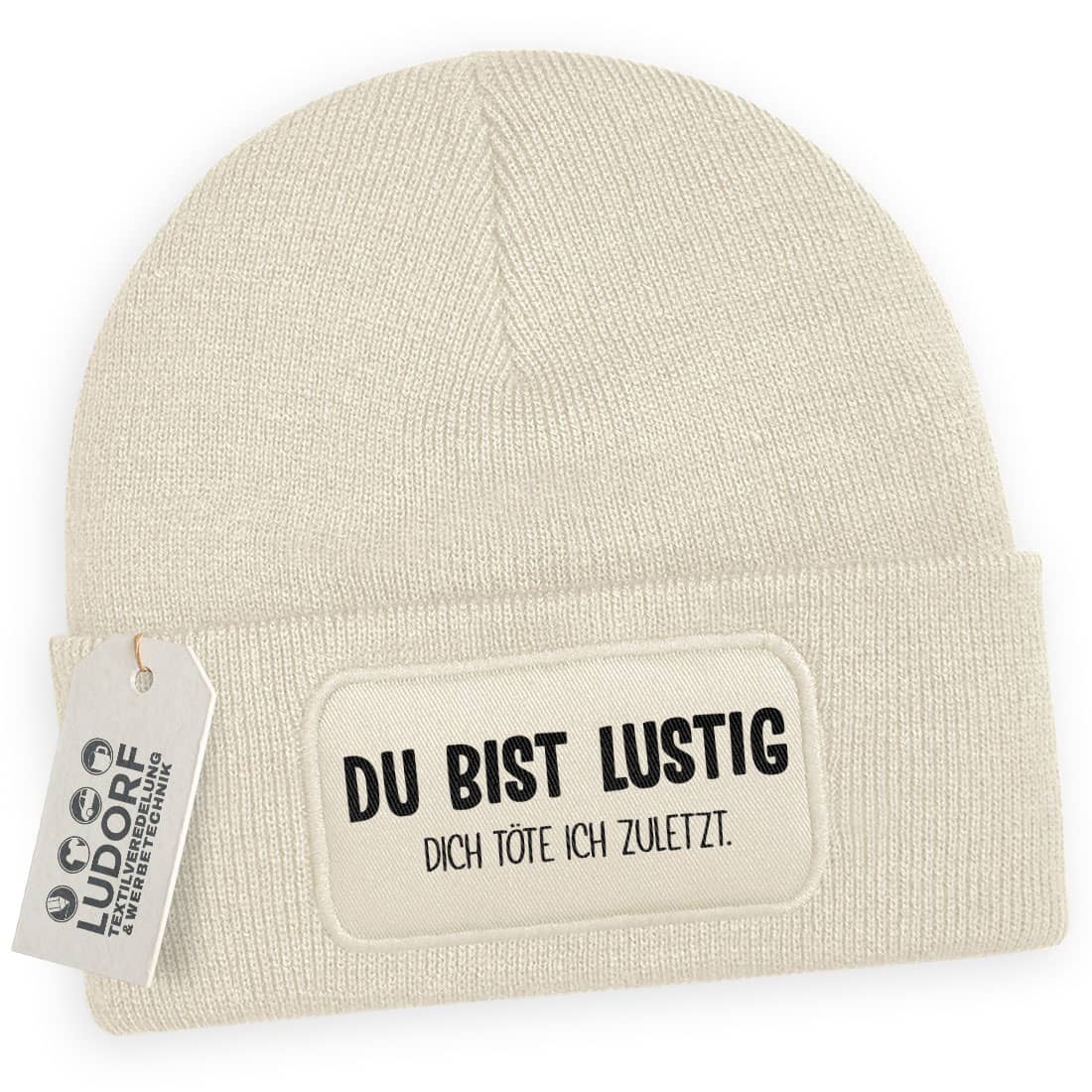 Beige Wintermütze mit humorvollem Spruch ‚Du bist lustig – dich töte ich zuletzt‘