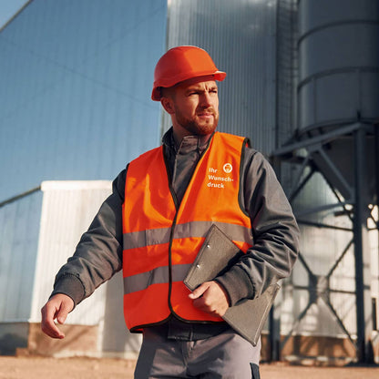 Person auf der Baustelle trägt reflektierende Warnweste, Schutzkleidung, Arbeitssicherheit